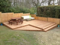 Another deck covering sloping ground